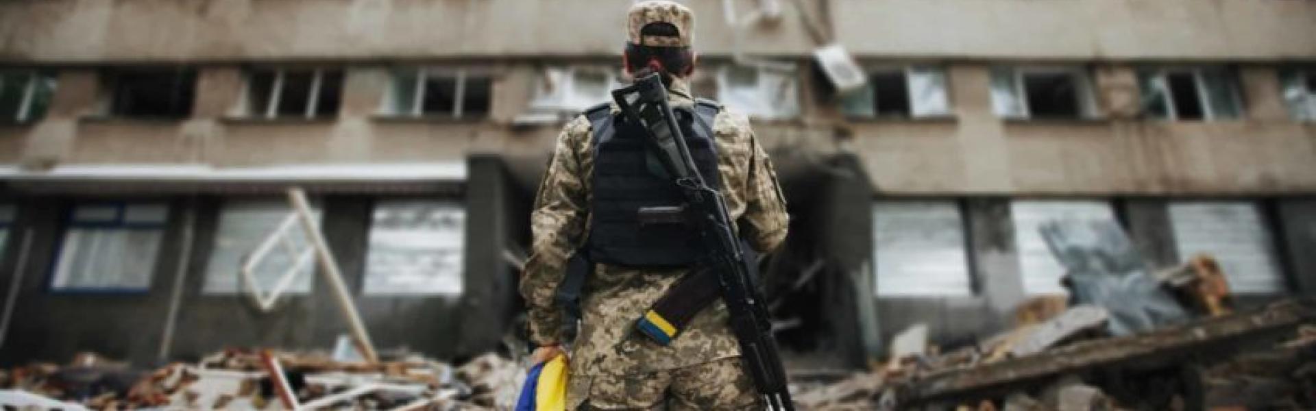 Ukraine soldier holding flag