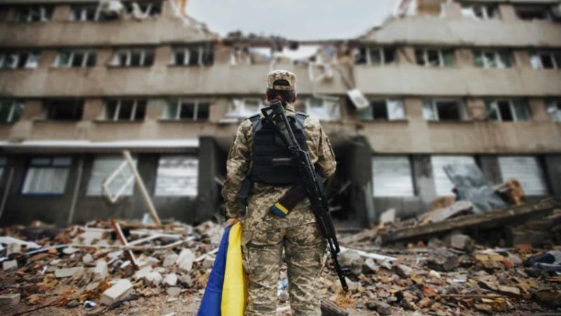 Ukraine soldier holding flag